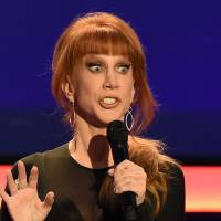 Host Kathy Griffin takes the stage last year at the AARP 15th Annual Movies For Grownups Awards at the Beverly Wilshire Hotel in Beverly Hills, California. Donald Trump castigated the well-known comedian on Wednesday after the release of a grislylooking photo showing her holding up a prop depicting the president’s bloodied severed head. CNN fired Griffin over the incident. CNN fires Kathy Griffin over Trump-likeness video as backlash builds