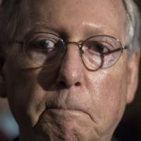 Senate Majority Leader Mitch McConnell pauses as he speaks following a closed-door strategy session at the Capitol in Washington Tuesday. McConnell says Republicans will have a “discussion draft” of a GOP-only bill scuttling former President Barack Obama’s health care law by Thursday. GOP senators preparing Obamacare replacement bill in secret, seen planning to rush vote despite differences