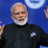 Indian Prime Minister Narendra Modi speaks in St. Petersburg, Russia, on June 2. Trump OKs $2 billion surveillance drone sale to India