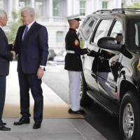 Vice President Mike Pence (left) greets Prime Minister of Montenegro Dusko Markovic outside the West Wing of the White House in Washington Monday. Montenegro becomes NATO's 29th member amid bitter opposition from Moscow