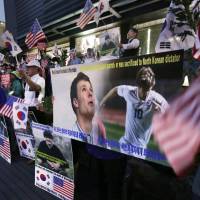Supporters stage a memorial rally for the late American student Otto Warmbier near the U.S. Embassy in Seoul on Friday. North Korea on Friday called itself the “biggest victim” in the death of Warmbier who was detained for more than a year and died days after being released in a coma. North Korea denies torturing Warmbier, says it is 'biggest victim' in U.S. student's death