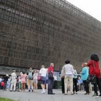People wait in line May 1 to enter the Smithsonian National Museum of African American History and Cultural on the National Mall in Washington. Smithsonian Secretary David Skorton said in a statement that a noose was found on Wednesday in the Segregation Gallery of the museum. Noose found in gallery at African American museum in Washington