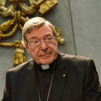 Australian Cardinal George Pell makes a statement at the Holy See Press Office in Vatican City on Thursday after being charged with past child sex offenses. Australian police charge top Vatican cardinal with sex offenses