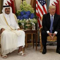 U.S. President Donald Trump holds a bilateral meeting with Qatar’s Emir Sheikh Tamim bin Hamad Al Thani, in Riyadh, Saudi Arabia on May 21. Qatar says Kuwait trying to mediate, solve Gulf crisis