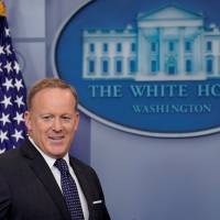 White House Press Secretary Sean Spicer arrives for his daily briefing at the White House in Washington Monday. Secret Service says it has no Trump tapes when asked by WSJ