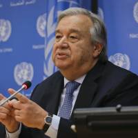United Nations Secretary-General Antonio Guterres speaks during his first news conference with U.N. correspondents on Tuesday at U.N. headquarters in New York. U.N. chief warns Trump that others will fill leadership role if U.S. disengages from world