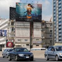An advertising billboard for “Wonder Woman” movie is pictured along a highway, east of Beirut, Lebanon on Wednesday. Lebanon bans 'Wonder Woman' film over Israeli actress
