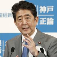 Prime Minister Shinzo Abe makes a speech in Kobe on Saturday. Reacting to Kake scandal, Abe now urges even more new animal medicine departments