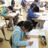Teaching manuals for new national curriculum guidelines stipulate that students must understand the legal steps for revising the constitution and the role of the Self-Defense Forces. Japan's school manuals add teaching on Constitution revision, SDF role, disputed islets, North abductions