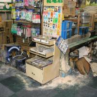 An electronics store in the city of Sakai, Osaka Prefecture, is seen after a man who was on fire rushed in Monday. KYODO Police investigate possible attempted murder after man rushes into Osaka store aflame