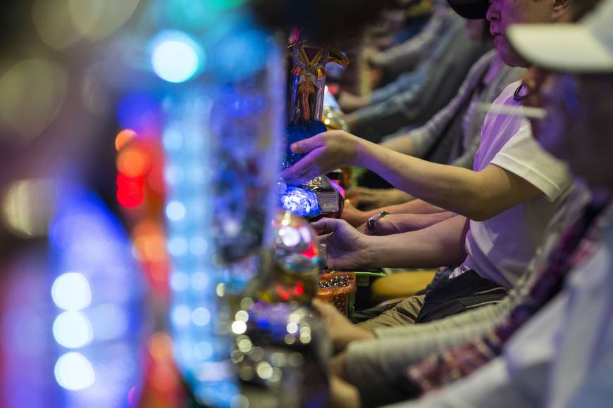 Customers at a pachinko parlor in Tokyo on May 16.