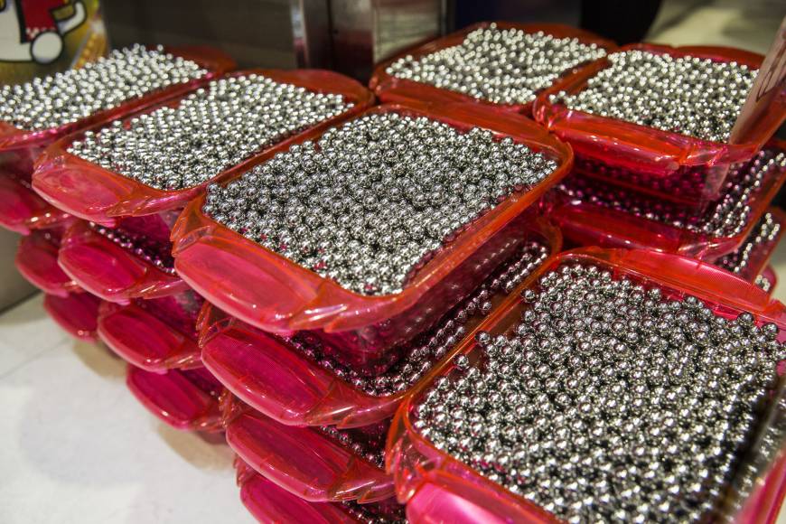 Pachinko balls sit on floor at a pachinko parlor in Tokyo on May 16.