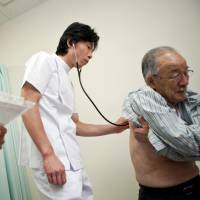 Overboard on overtime: Doctors in Japan are seldom given sympathy for long hours because their salaries are considered generous. One woman's suicide shines a harsh light on the plight of Japan's doctors