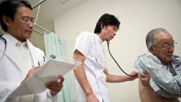 Overboard on overtime: Doctors in Japan are seldom given sympathy for long hours because their salaries are considered generous. One woman's suicide shines a harsh light on the plight of Japan's doctors