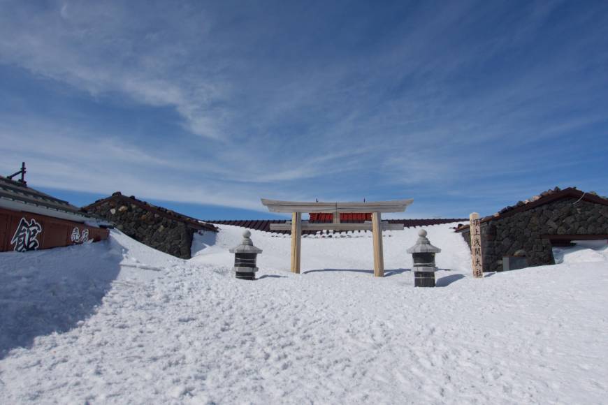Snowed in: The torii gate of the shrine atop Mount Fuji welcomes its guests.