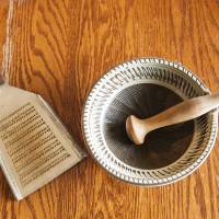 Tried and true: An oroshigane grater (left) and a set of suribachi mortar and surikogi pestle, traditional tools for a modern kitchen. Getting in the groove with 'suribachi' and 'surikogi,' the Japanese mortar and pestle