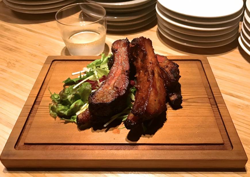 Another8 Beyond the beer: The baby back ribs at Another8 come slathered in BBQ glaze. | ROBBIE SWINNERTON