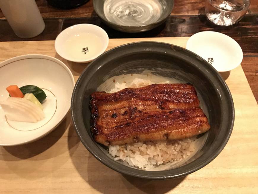 Ryo Perfectly paired: Ryo's una-don, grilled eel glazed with original kabayaki sauce, matched with warm sake. | ROBBIE SWINNERTON