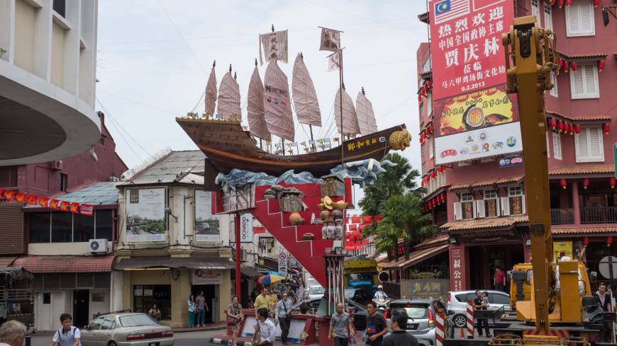 Not-so-subtle: A replica of one of the treasure ships of Zheng He sits above a street in Malacca, Malaysia, where the Chinese admiral first landed over 600 years ago. 'Everything Under the Heavens: How the Past Helps Shape China's Push For Global Power': Waking up to China's dream of holding court