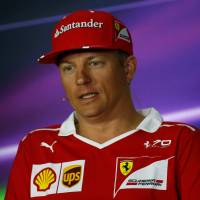 Ferrari driver Kimi Raikkonen speaks during a news conference on Thursday in Baku. Mercedes driver Hamilton calls Ferrari rival Vettel favorite for F1 championship
