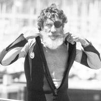 Jack O’Neill, seen in an August 1982 file photo, suits up in the small craft harbor before windsurfing off Santa Cruz, California. The surfing world icon has died at age 94. Wetsuit pioneer O'Neill dies at 94