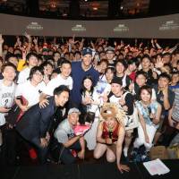 Brook Lopez poses with fans during an NBA Finals viewing party last Friday in Tokyo. Nets star Lopez relishes chance to travel globe