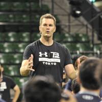 NFL superstar Tom Brady of the New England Patriots speaks at a clinic for Japanese quarterbacks at Ariake Colosseum on Wednesday. Patriots QB Brady wraps up tour of Asia with trip to Tokyo