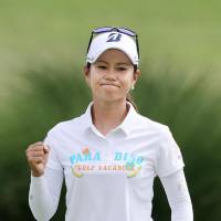 Ai Miyazato pumps her fist after a birdie putt on the 16th hole during the second round on Saturday in Rogers, Arkansas. Miyazato makes final round; Ryu shoots course-record 61