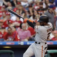 San Francisco’s Denard Span strokes a single against Philadelphia in the second inning on Friday night. Rookie pitcher Blach, Span carry Giants past Phillies