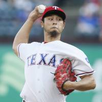 Rangers right-hander Yu Darvish pitches against the Mets on Wednesday at Globe Life Park. Darvish solid in no-decision