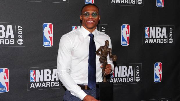 Oklahoma City Thunder guard Russell Westbrook poses with his Most Valuable Player trophy at the NBA Awards show in New York on Monday night. Westbrook wins NBA MVP award