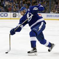 The Lightning’s Steven Stamkos, seen in a February 2016 file photo, breaks his stick on a shot attempt against the Jets during the second period in Tampa, Florida. Sticks shatter for NHL players sometimes at the worst times