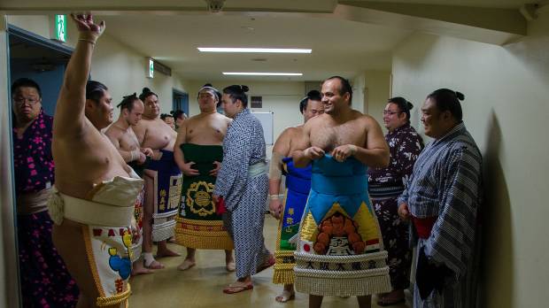 Osunaarashi (centre right) from Egypt prepares for his first ring-entering ceremony on July 6, 2013, in Nagoya. Nagoya Basho contenders looking to stay cool in tournament known for upsetting the odds