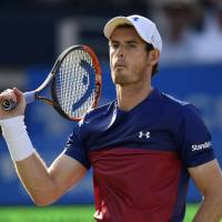 Andy Murray reacts during his first-round match against Jordan Thompson at Queen’s Club on Tuesday. Murray stunned by lucky loser in Wimbledon warmup