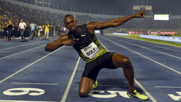 Usain Bolt strikes his trademark victory pose after winning the 100-meter race at the Racers Grand Prix in Kingston on Saturday. Nervous Bolt wins final 100 meters on home soil