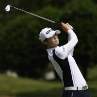 Park Sung-hyun watches her drive on the 11th hole during the first round of the NW Arkansas Championship on Friday in Rogers, Arkansas. Rookie Park capitalizes on six straight birdies to shoot 8-under 63, grab lead