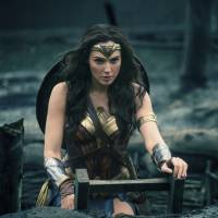 Gal Gadot in a scene from “Wonder Woman”. The film grossed $103.1 million in North America over its debut weekend, a figure that easily surpassed industry expectations. 'Wonder Woman' conquers milestone with $100.5 million debut