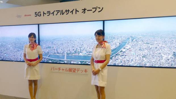 Fifth-generation wireless communications technology is demonstrated at the Tokyo Skytree Soramachi shopping complex in Sumida Ward, Tokyo, in May. Companies are accelerating efforts to make 5G technology the basis for broadcast and communications services during the 2020 Tokyo Olympics. Boom in convenience seen as firms gear up for Olympic profits