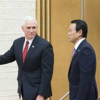 Deputy Prime Minister Taro Aso, who doubles as finance minister, and U.S. Vice President Mike Pence, arrive for a joint news conference after the U.S.-Japan economic dialogue in Tokyo on April 18. Japan and U.S. start planning next round of high-level economic talks