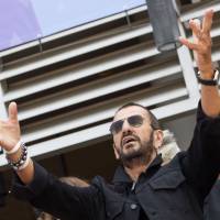 Ringo Starr, family and friends attend his birthday celebration at Capitol Records on Friday in Hollywood. Ringo Starr turns 77, will play with Paul McCartney on new album