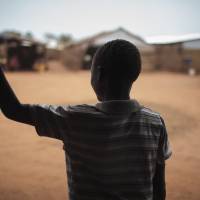 Batista, 13, who five months ago was drugged and raped in the middle of the night, stands in the doorway of a psychosocial support clinic in a camp for the internally displaced in Wau, South Sudan, May 13. Four years into South Sudan’s devastating civil war, the world’s youngest nation is reeling from sexual violence on a “massive scale,” a new Amnesty International report says Monday. Amnesty report cites sexual violence on 'massive scale' in South Sudan, including in refugee camps