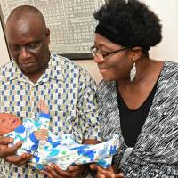 Isaiah Somuah Anim, 59, and his wife, Akosua Budu Amoako, 59, hold their son Isaiah Somuah Anim, Jr. in Dr. Khushru Irani’s office in Niskayuna, New York, on July 13. Budu says she and her husband had tried for years to get pregnant after they married 38 years ago, but eventually stopped trying. Thanks to fertility treatments, woman gives birth at 59 after trying for decades to get pregnant