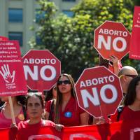Activists protest abortion in front of the La Moneda presidential palace in Santiago in 2016. Chile’s Senate early Wednesday took a major step toward lifting the socially conservative country’s total ban on abortions by agreeing to decriminalize the procedure in certain cases. Chile Senate OKs bill allowing abortion in some cases but conservatives vow to appeal it