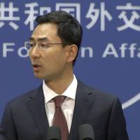 In this image made from video, Chinese Foreign Ministry spokesman Geng Shuang speaks during a press briefing in Beijing Tuesday. China said it shouldn’t be held responsible alone for resolving the North Korean nuclear standoff and accused other countries of shirking their responsibilities in the effort to reduce tensions. Beijing slams 'China responsibility theory' of accountability for North Korea's nuclear tensions