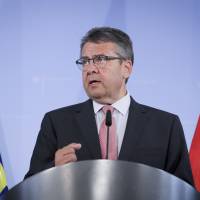 German Foreign Minister Sigmar Gabriel speaks during a news conference in Berlin on Thursday. Gabriel said his country will revise its travel advice for Turkey following the jailing of a German human rights activist who has no ties to the country. Germany ratchets up economic pressure on Turkey as rights row escalates
