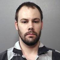 This photo provided Monday by the Macon County Sheriff’s Office in Decatur, Illinois, shows Brendt Christensen, the suspect in the kidnapping of visiting University of Illinois Chinese scholar Yingying Zhang. At Christensen’s first court appearance at federal court in Urbana, a judge ordered Christensen held without bond. Man who tapped 'Abduction 101' forum denied bond in kidnapping, suspected murder of Chinese scholar