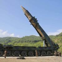 North Korean leader Kim Jong Un (second from right) inspects the preparation of the launch of a Hwasong-14 intercontinental ballistic missile in North Korea’s northwest on July 4. Where North Korea's missile program is at after recent ICBM launch