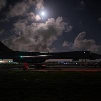 A U.S. Air Force B-1B bomber prepares for take off from Andersen Air Force Base in Guam to conduct a sequenced bilateral mission with South Korean F-15 and Air Self-Defense Force F-2 fighter jets on Friday. Bombers buzz Korean Peninsula as U.S. says it is 'ready to unleash full lethal capability of allied air forces'