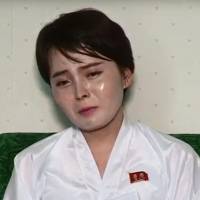 North Korean defector Lim Ji-hyeon, who appeared in several South Korean TV shows featuring defectors after settling in Seoul in 2014, is seen in a screen shot from video posted to a propaganda website. North Korean celebrity defector 'returns home,' calling South a 'capitalist hell'