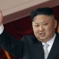 North Korean leader Kim Jong Un waves during a military parade in Pyongyang on April 15. North Korea threatens U.S. with 'nuclear hammer' after CIA chief appears to hint at regime change